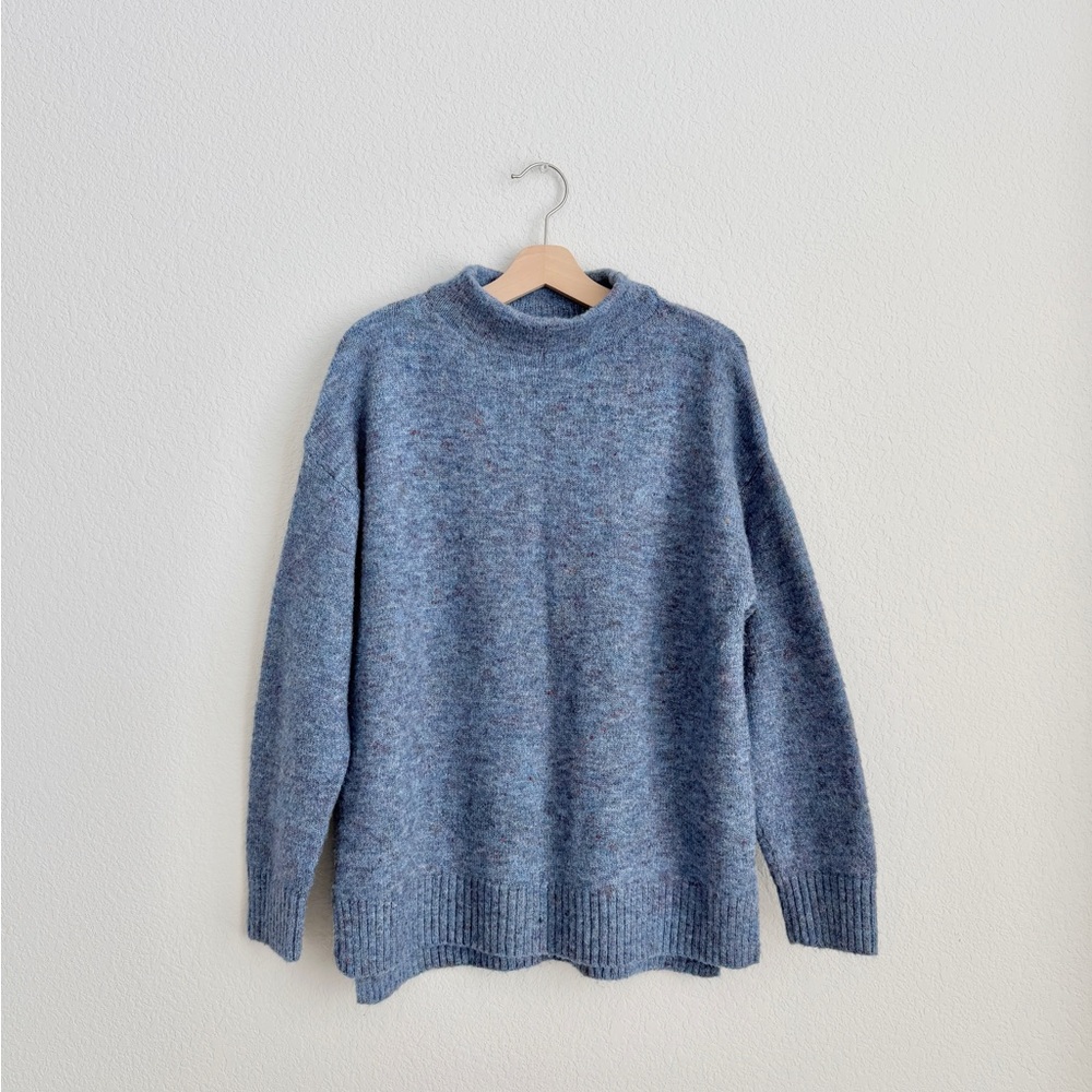 well worn speckled sweater